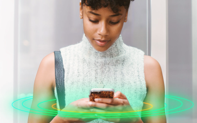 woman with a cell phone and green circles radiating out from it