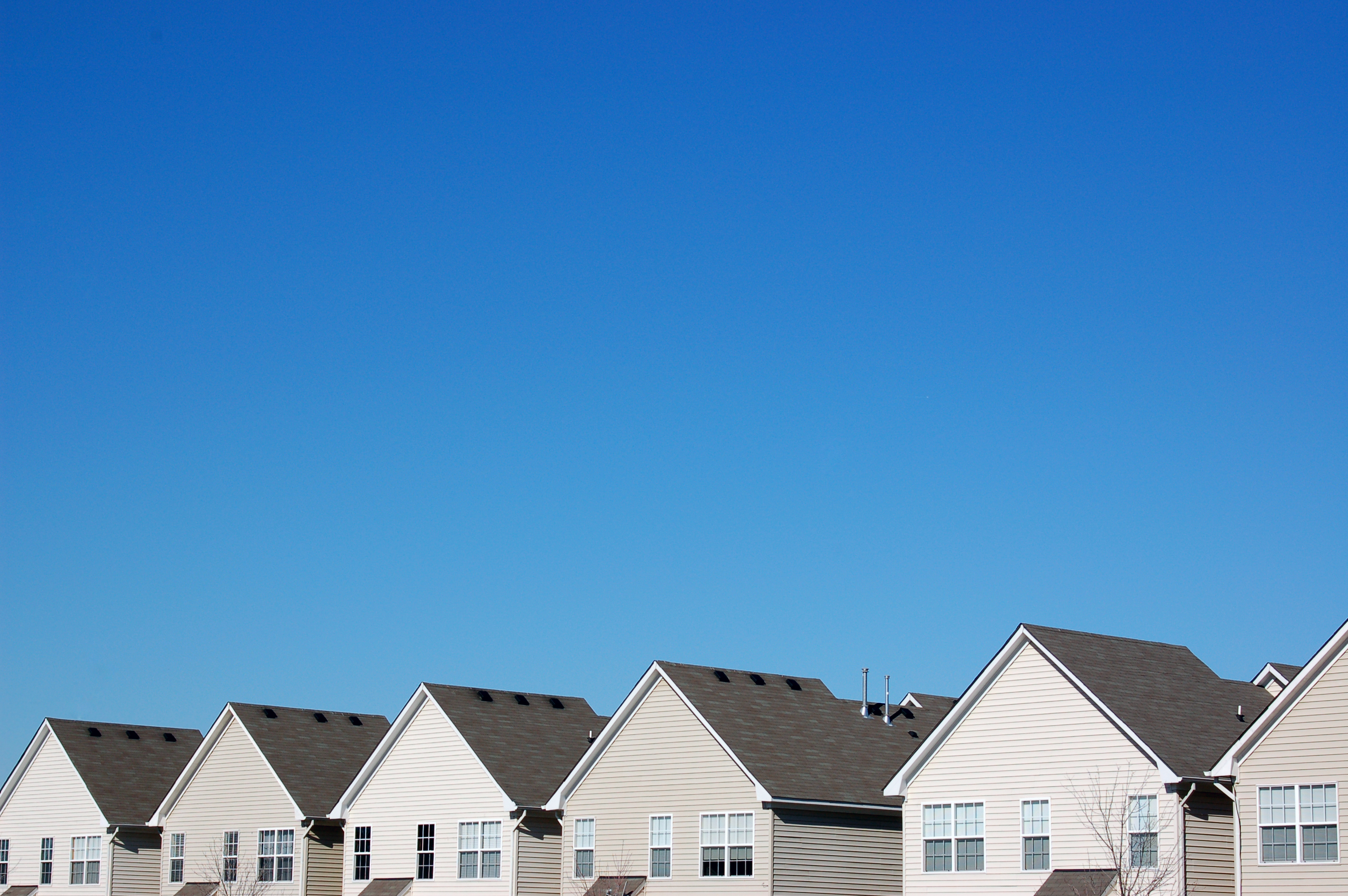 house roofs and blue sky