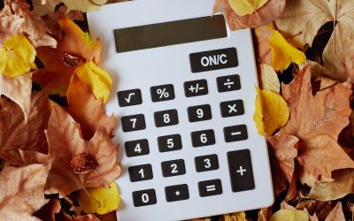 calculator in autumn leaves
