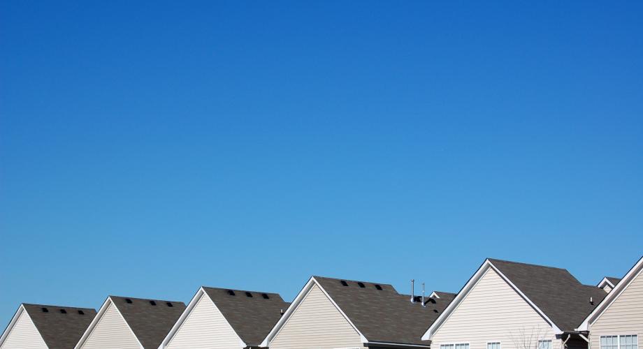 house roofs and blue sky