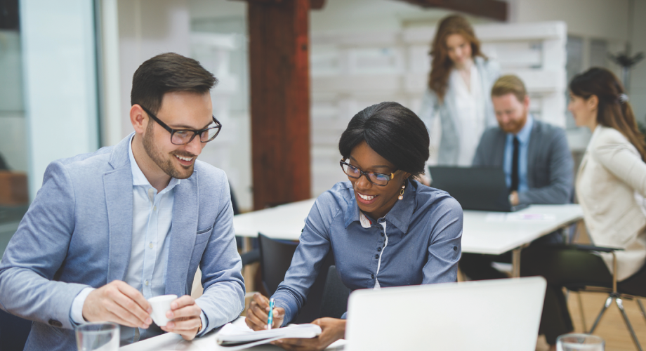 two business people working together